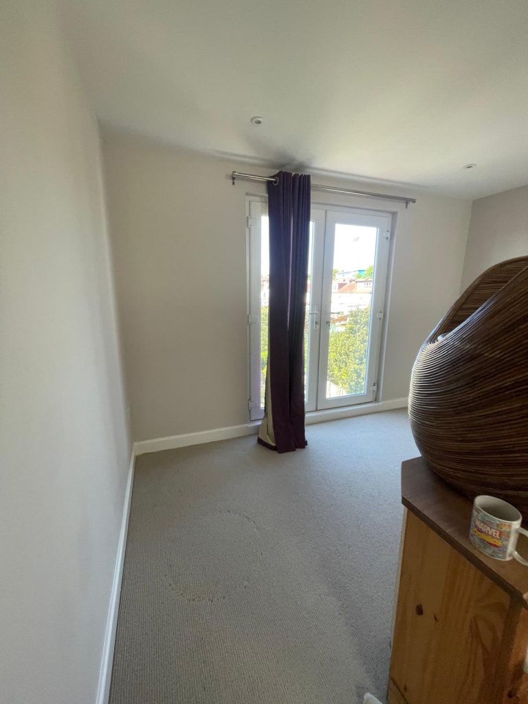 Bedroom interior painting completed in Kellaway Avenue BS6 Bristol with fresh neutral walls and clean white woodwork